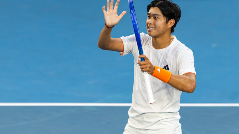 Learner Tien salutes crowd