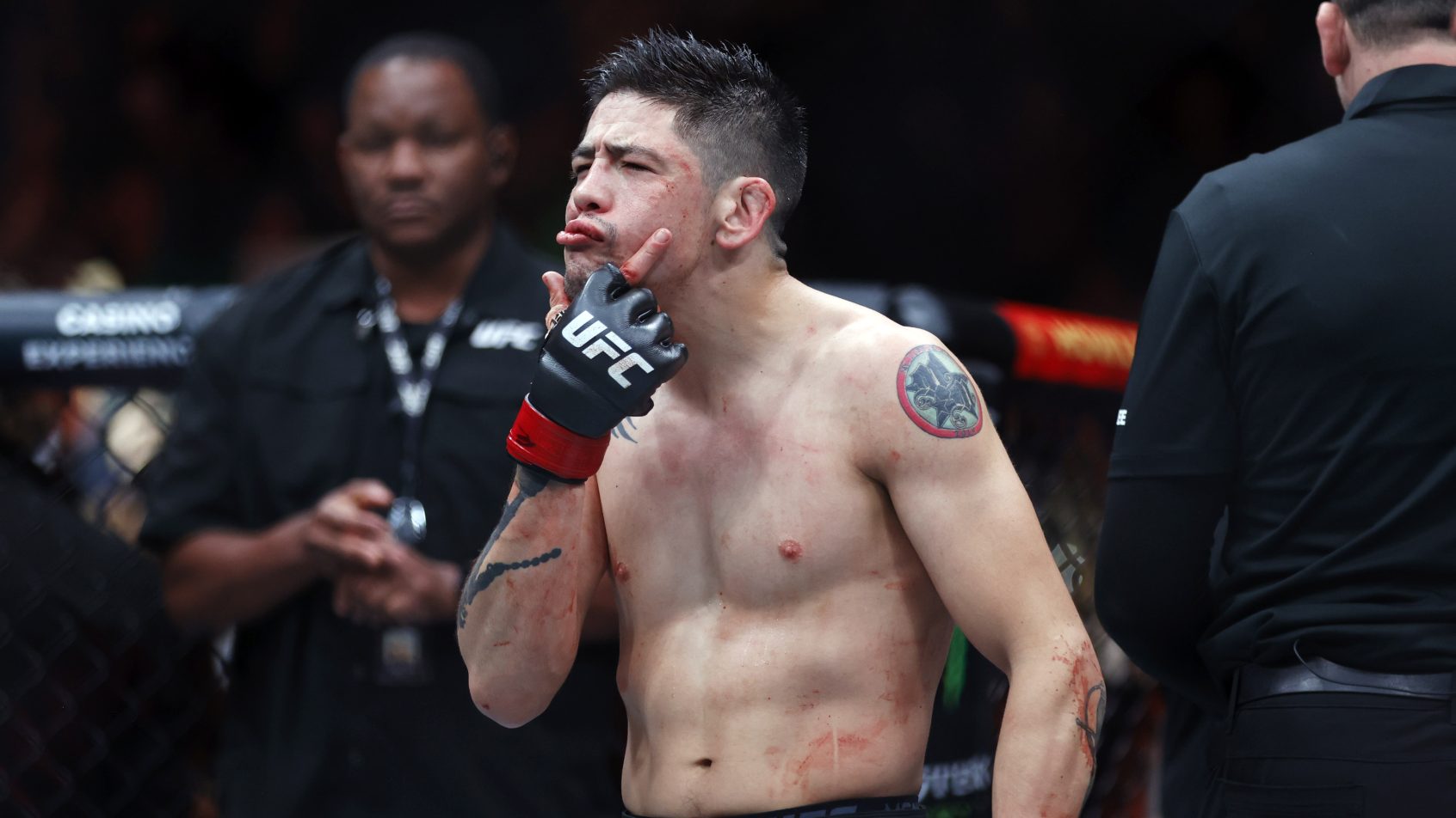 Brandon Moreno celebrates after defeating Amir Albazi