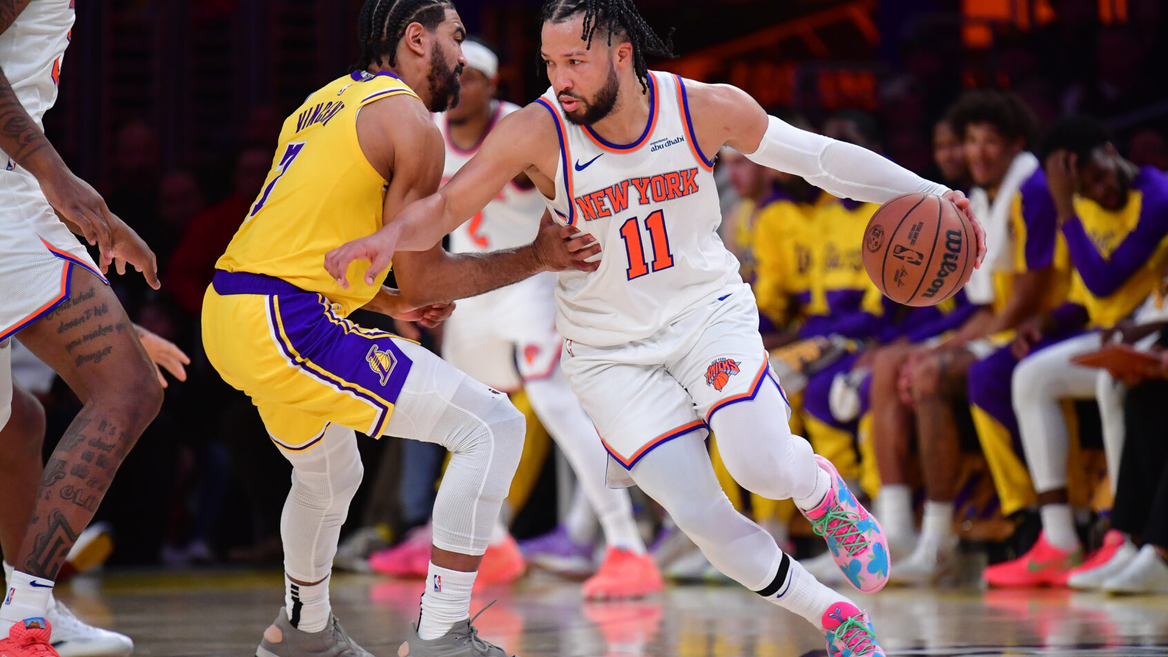 New York Knicks guard Jalen Brunson tries to get around Los Angeles Lakers guard Gabe Vincent