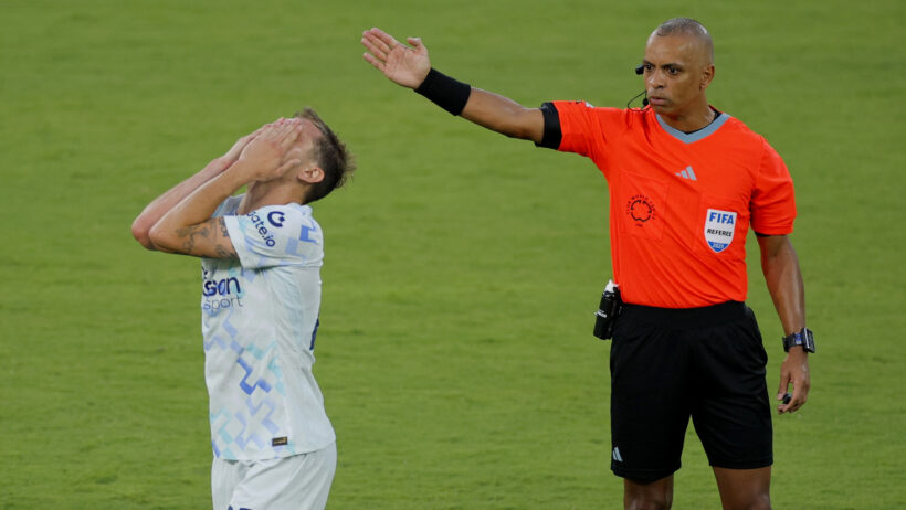 Inter Milan's Nicolo Barella holds his head in his hands