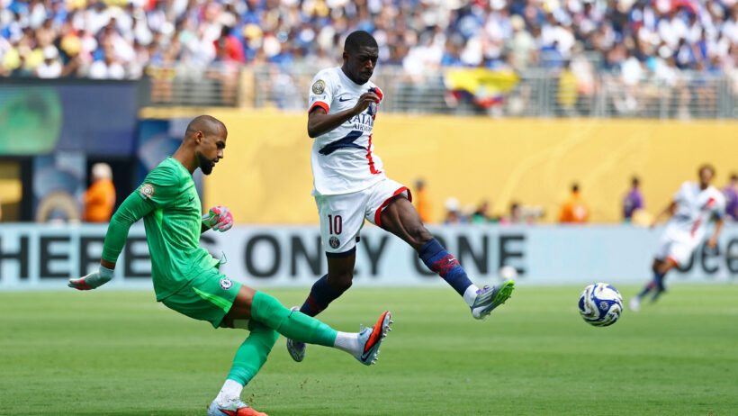 Paris Saint-Germain forward Ousmane Dembele chasing after the ball