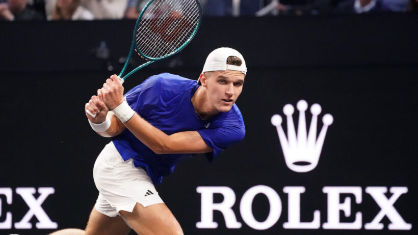 Jakub Mensik hits a backhand