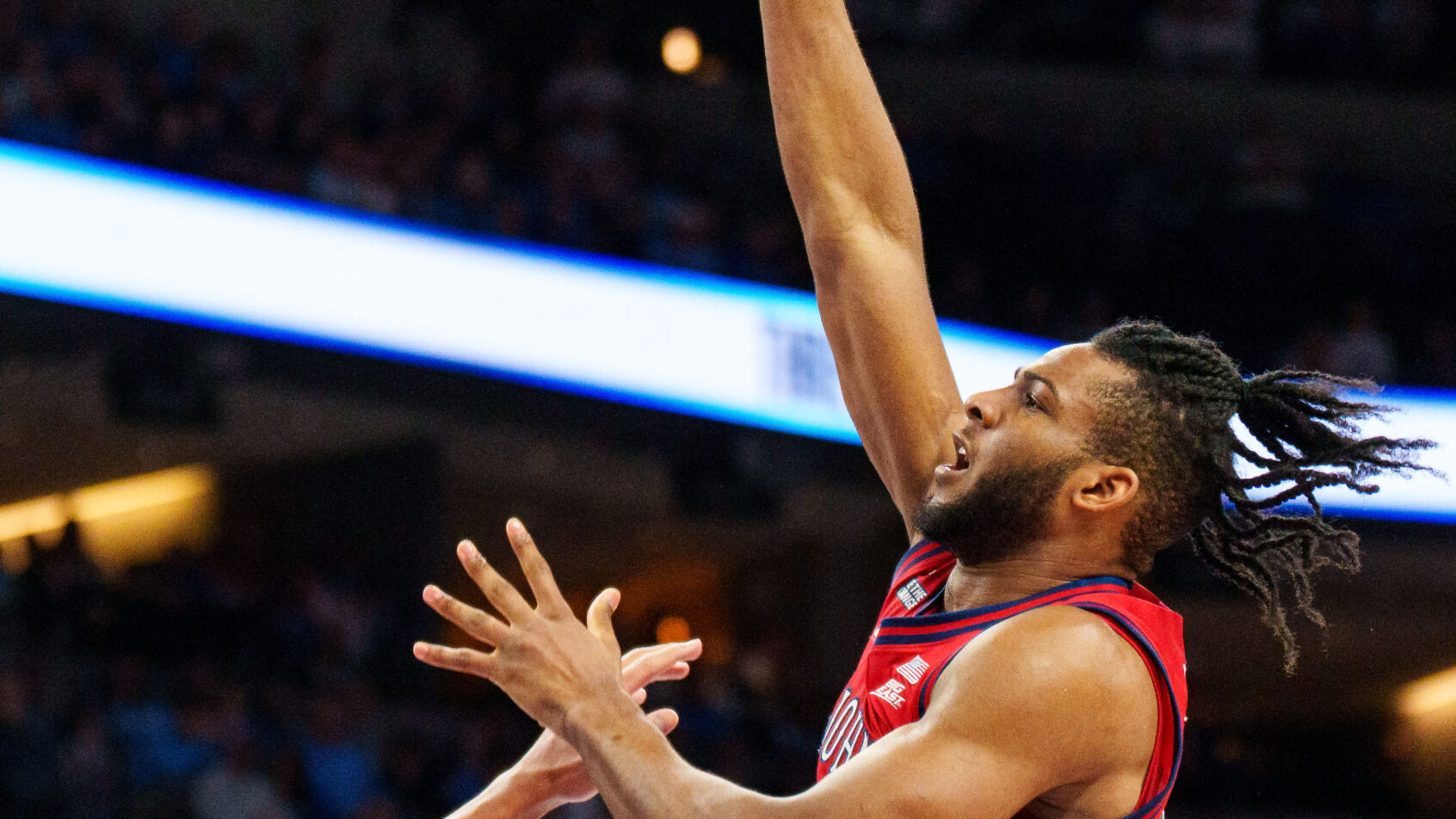 Zuby Ejiofor shooting over defender