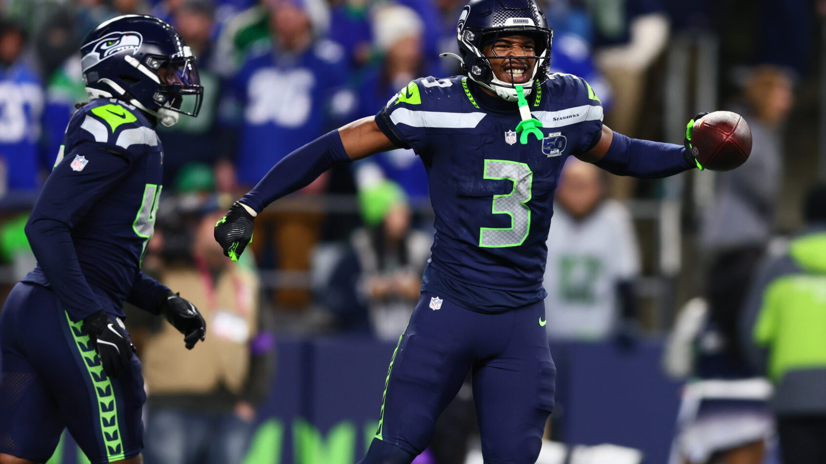 Nick Emmanwori celebrates a Seahawks fumble recovery.