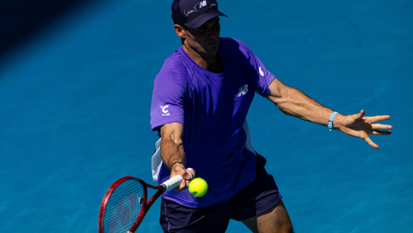 Tommy Paul hitting a forehand