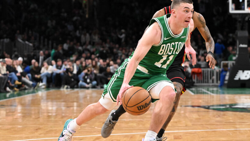 Boston Celtics guard Payton Pritchard driving to the basket