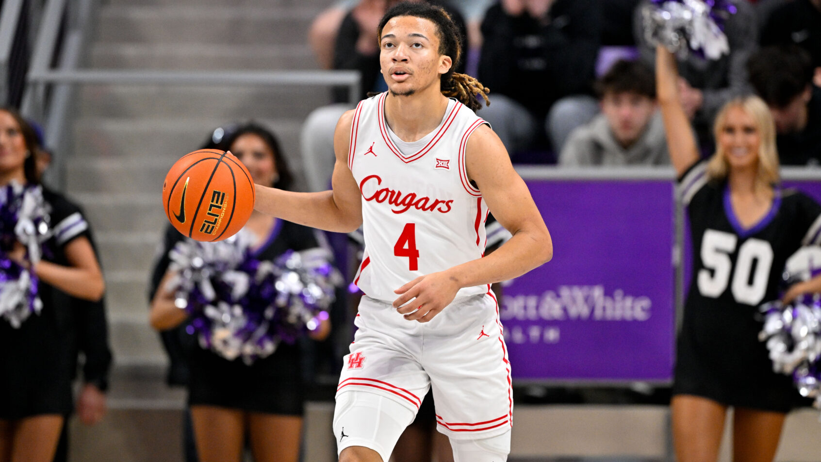 Houston Cougars guard Kingston Flemings leads the way.
