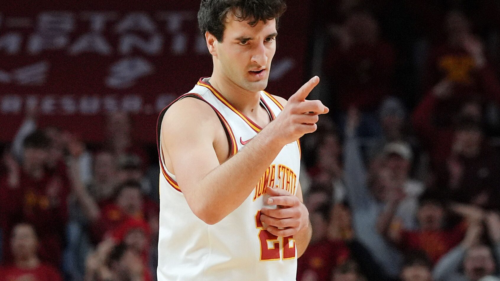 Iowa State Cyclones forward Milan Momcilovic pointing
