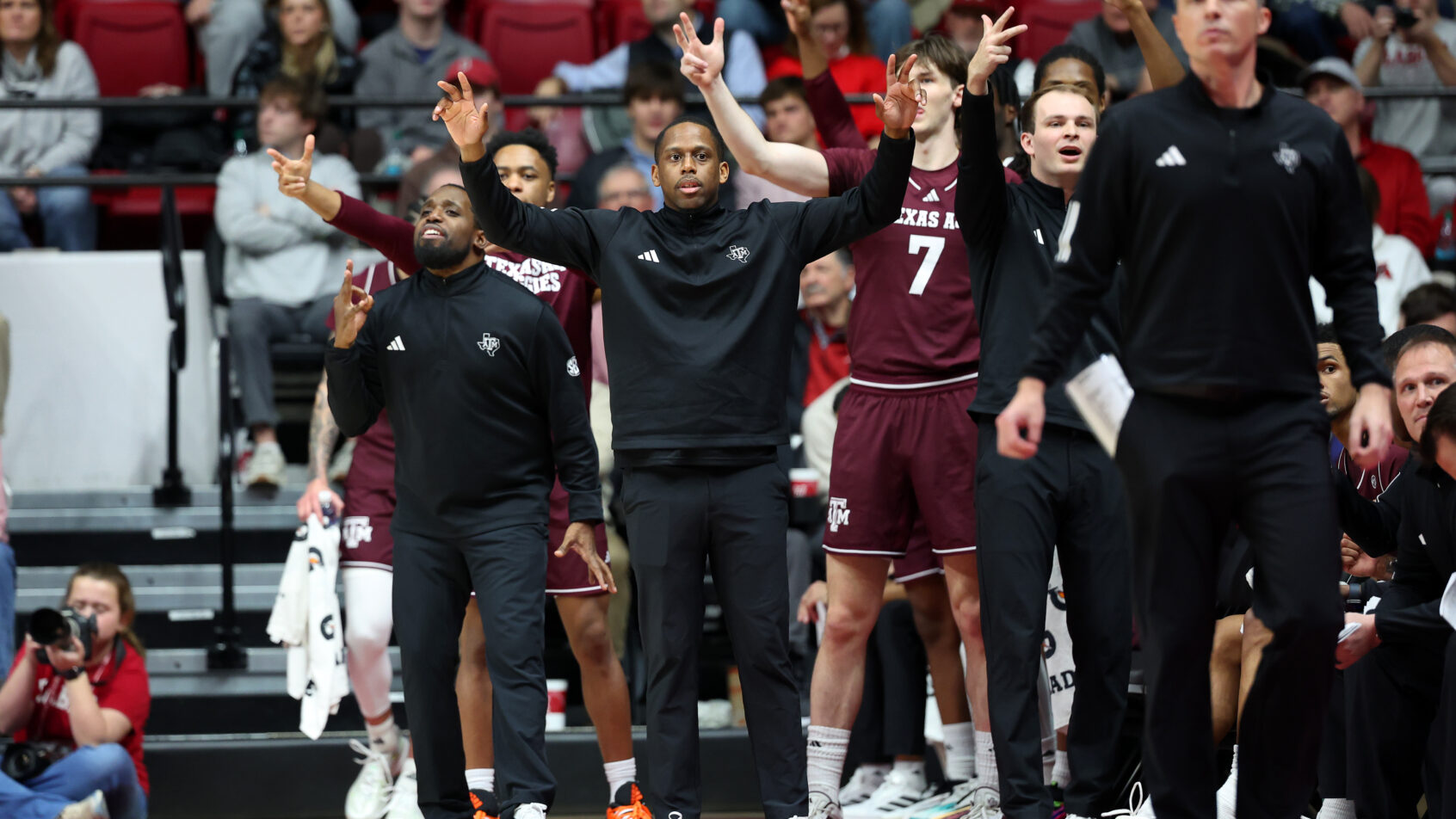 Texas A&M Aggies bench celebrates a bucket versus Alabama.