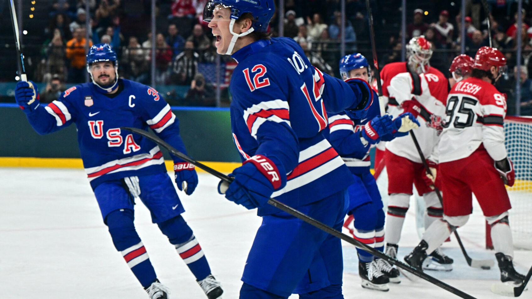 Matt Boldy celebrates an American goal at the Olympics.