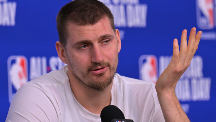 Team World center Nikola Jokic gestures at a press conference