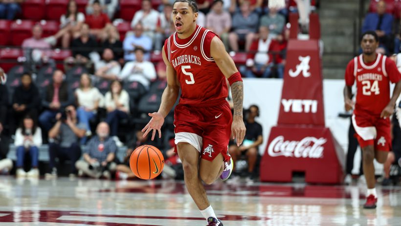 Darius Acuff Jr dribbling upcourt