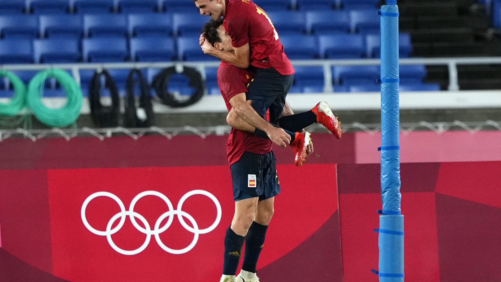 Team Spain forward Mikel Oyarzabal and midfielder Pedri Gonzalez celebrate a goal