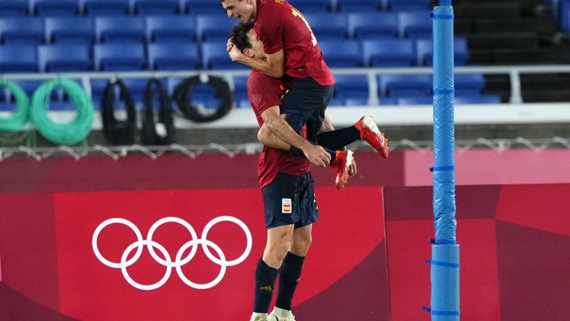 Team Spain forward Mikel Oyarzabal and midfielder Pedri Gonzalez celebrate a goal