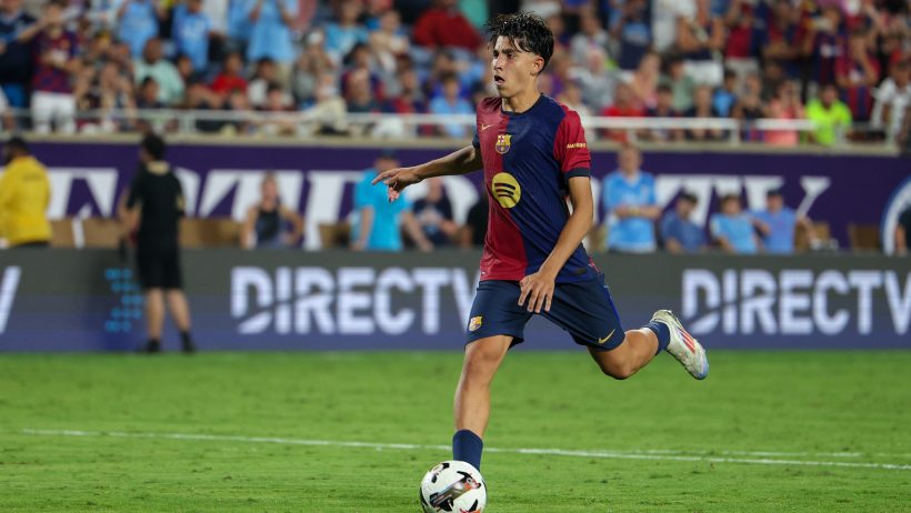 Barcelona forward Lamine Yamal taking a penalty