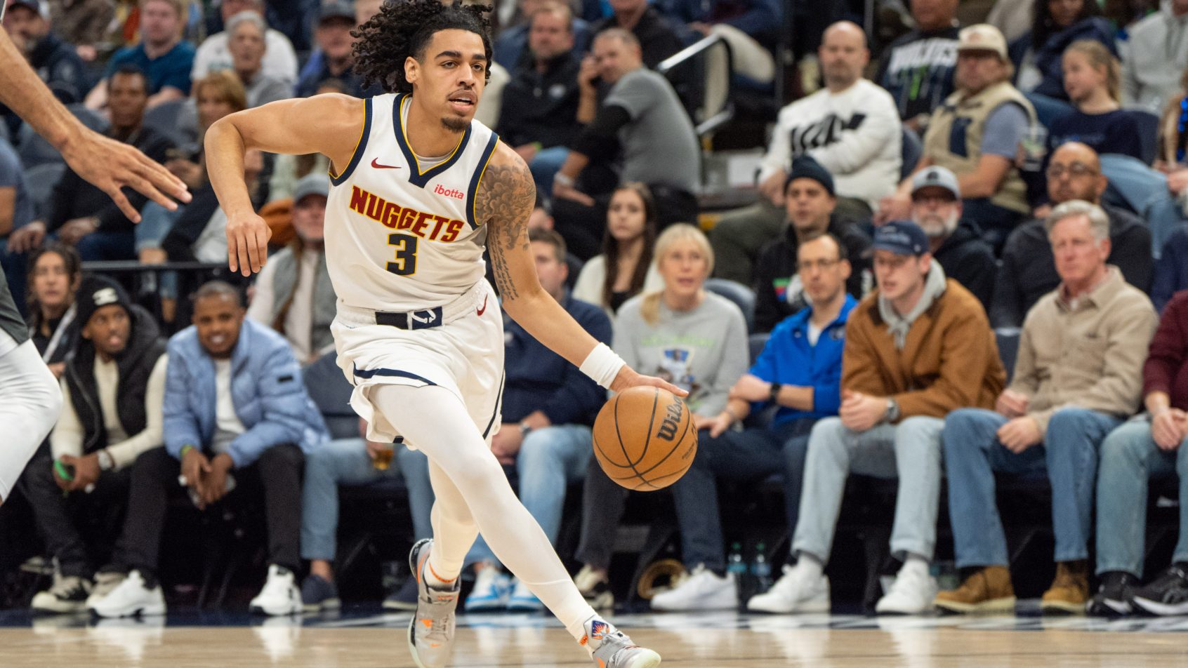 Denver Nuggets guard Julian Strawther dribbling