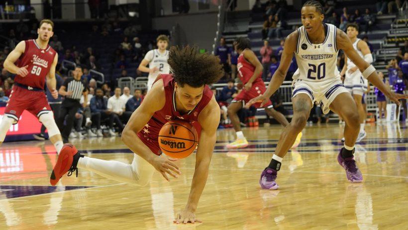 Illinois-Chicago Flames guard Javon Jackson dives for a ball