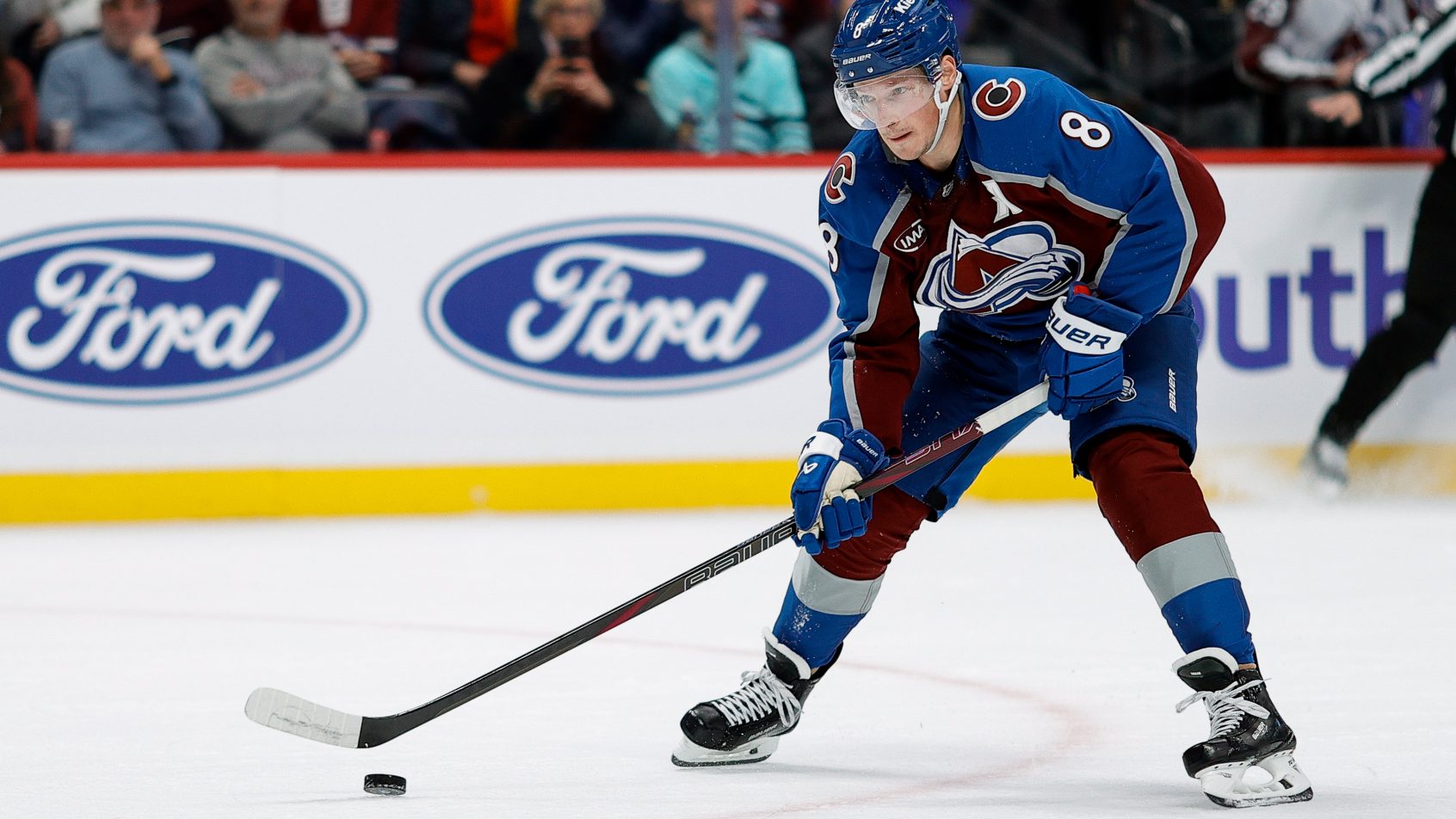 Colorado Avalanche defenseman Cale Makar controls the puck