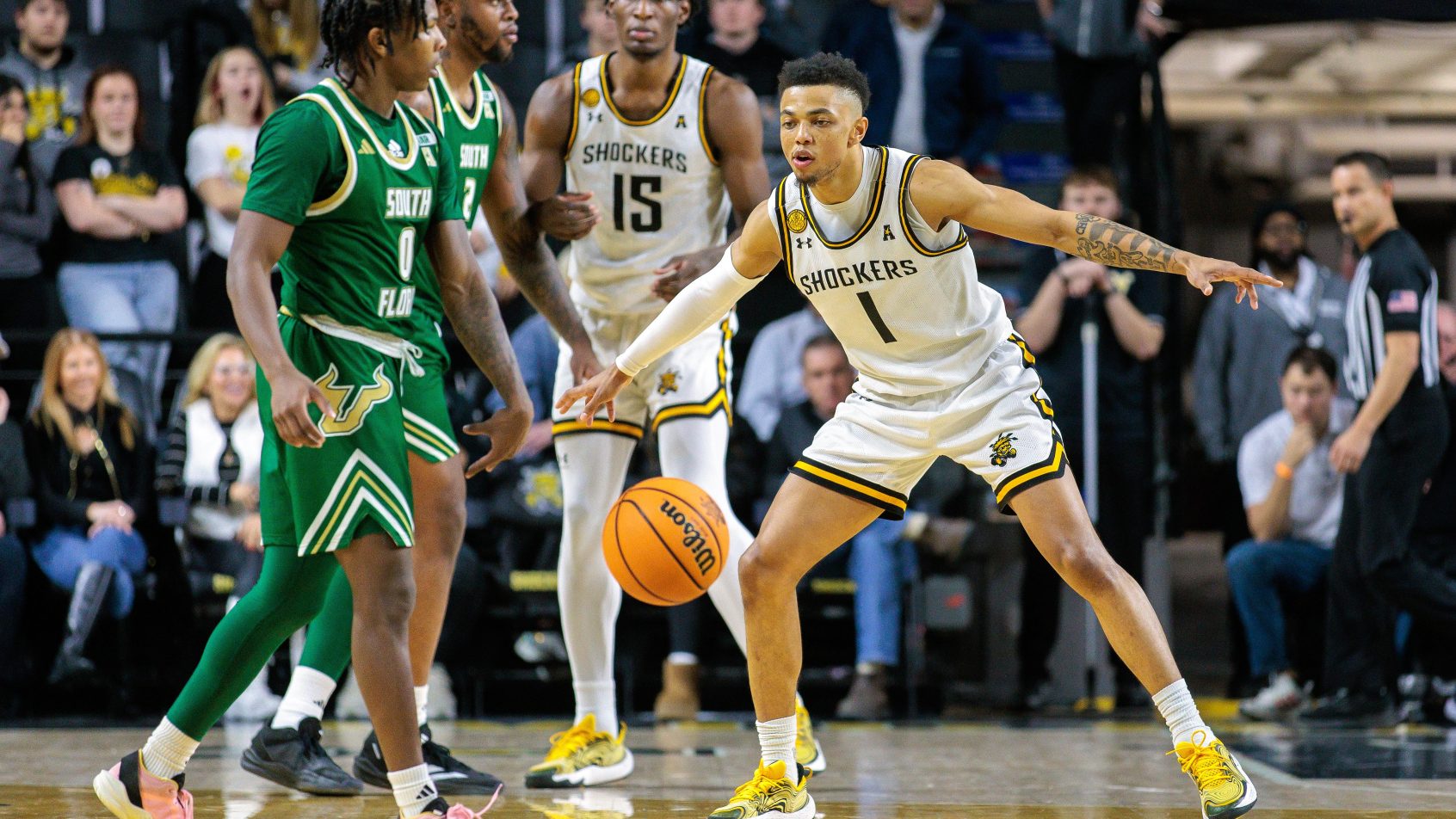 Wichita State Shockers guard Xavier Bell dribbles slowly