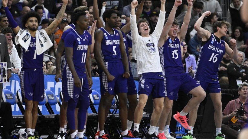 The High Point Panthers bench celebrates a bucket versus Purdue at the NCAA Tournament.