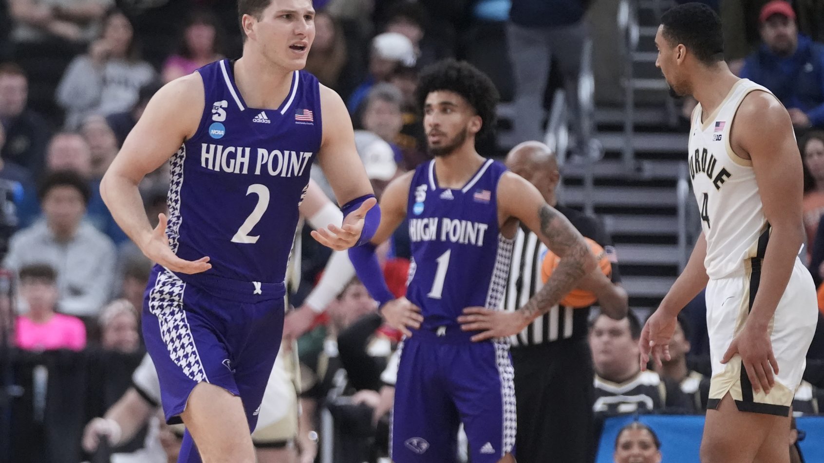 High Point Panthers guard Chase Johnston running off the court