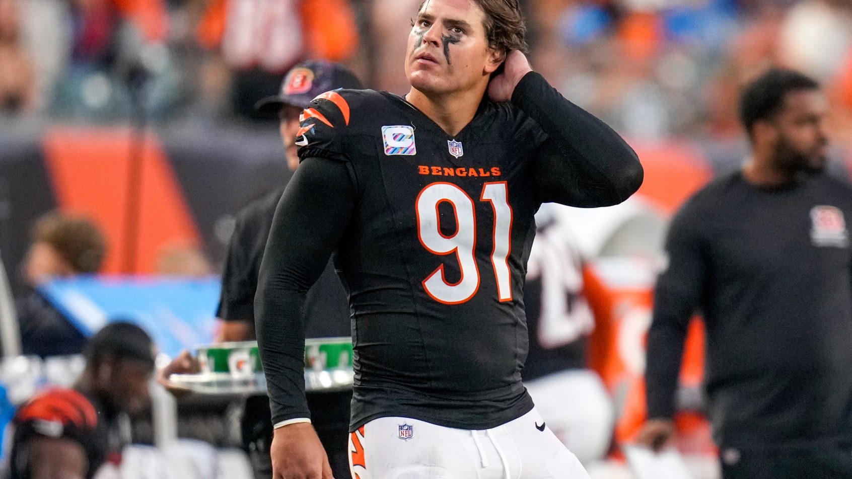 Trey Hendrickson watches a replay in a game versus the Detroit Lions.