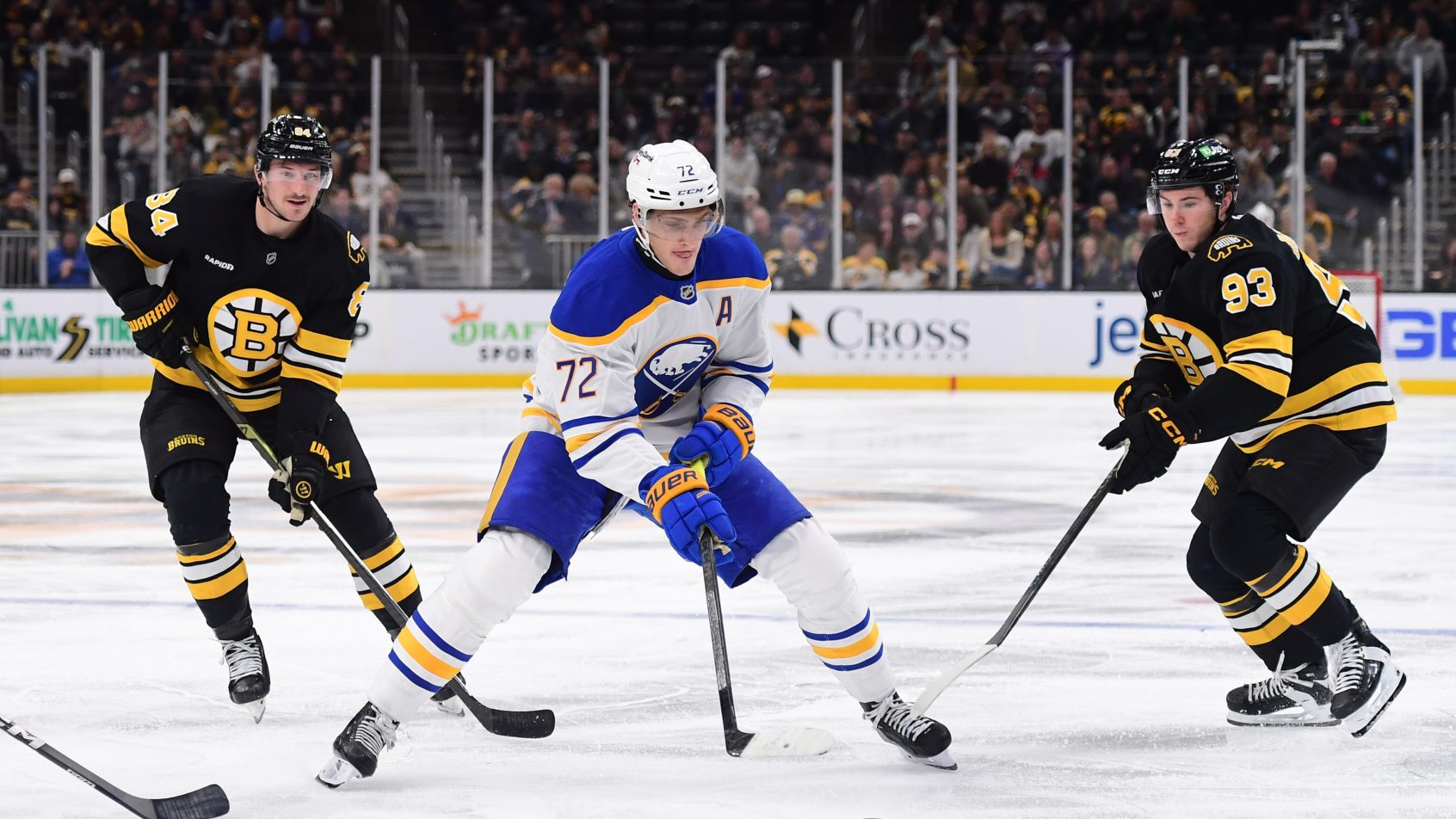 Buffalo Sabres center Tage Thompson controls the puck