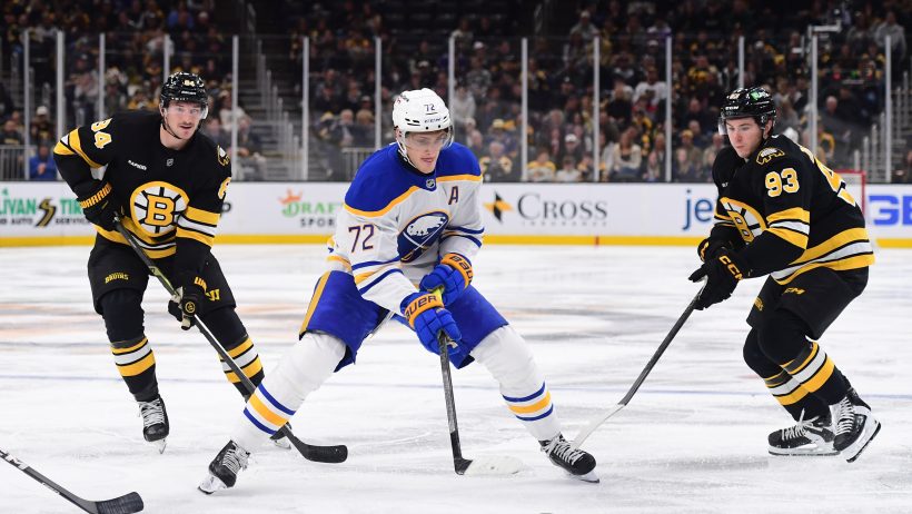 Buffalo Sabres center Tage Thompson controls the puck