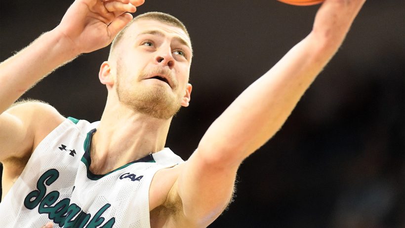 UNCW center Patrick Wessler goes for a layup