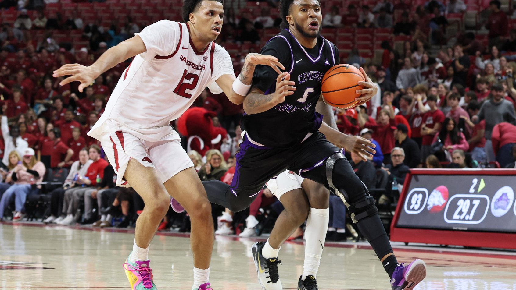 Tyler Lee drives to the hoop versus Arkansas.