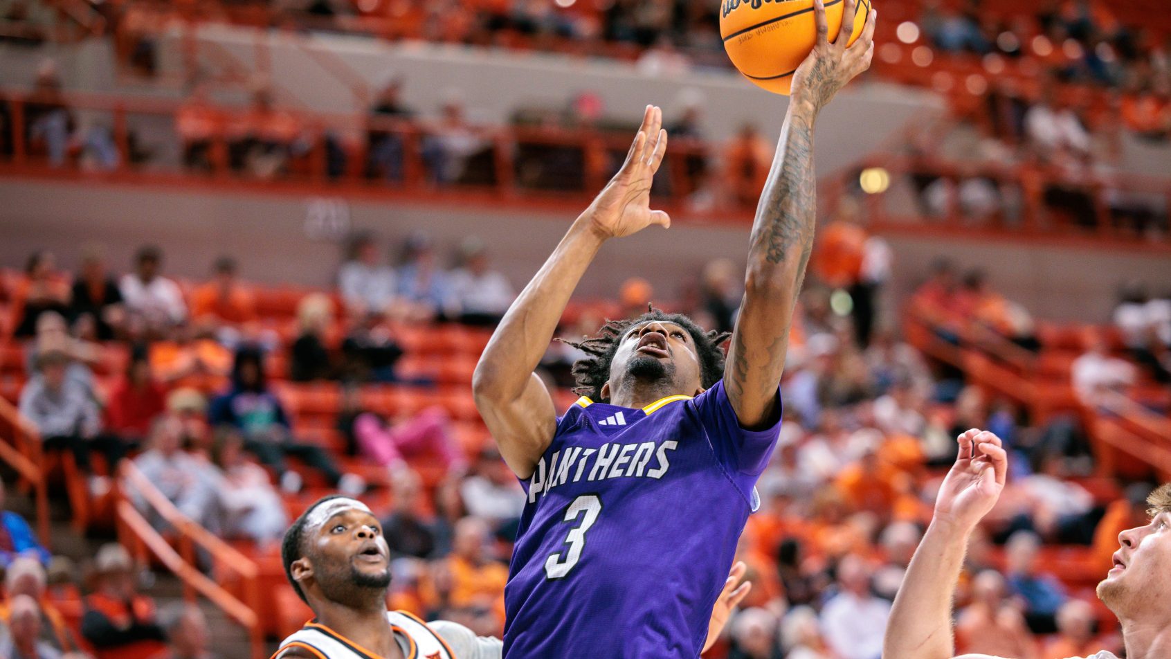 Tai'Reon Joseph goes to the hoop in a game versus Oklahoma State.