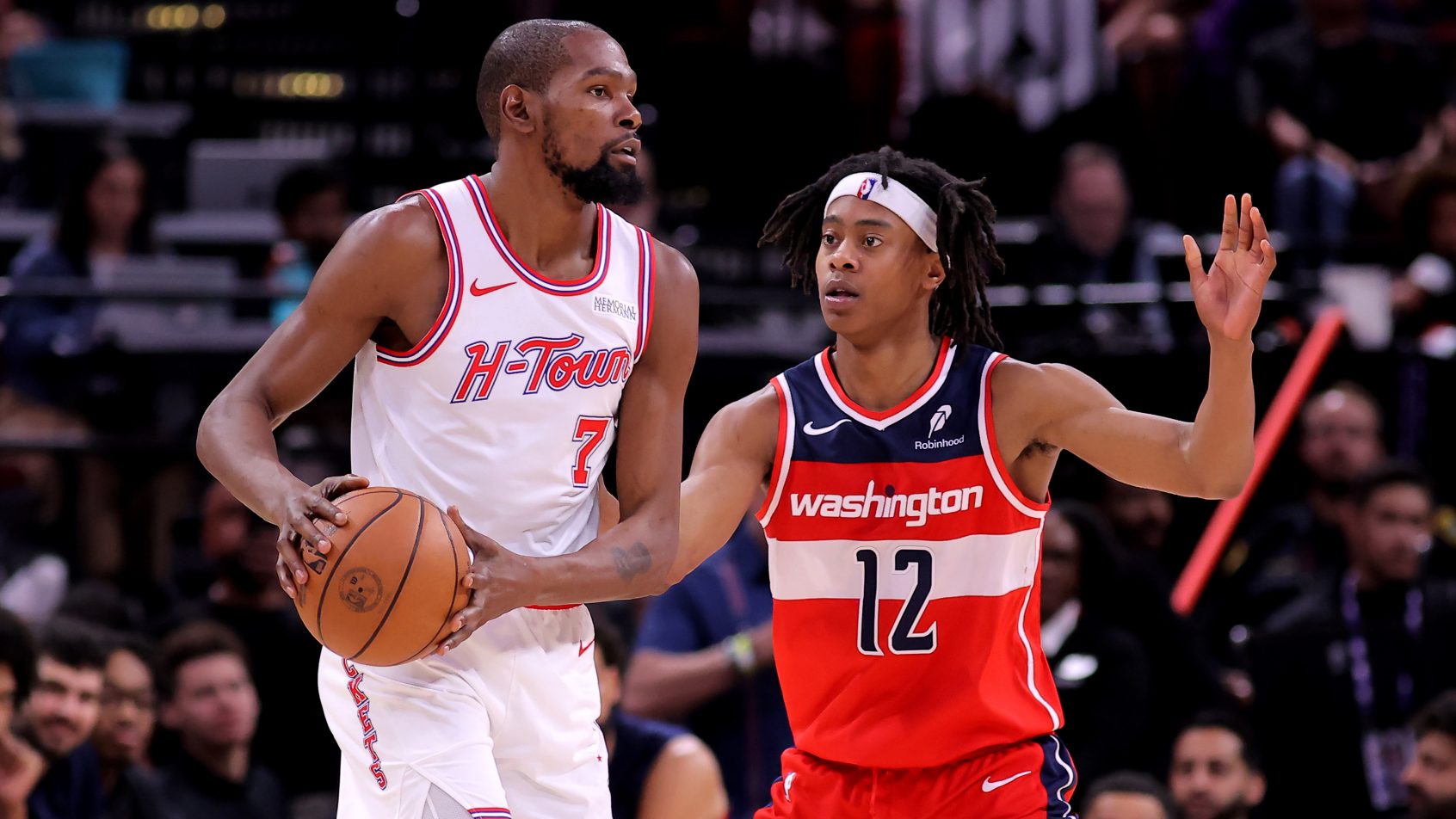 Houston Rockets forward Kevin Durant guarded by Washington Wizards guard Tre Johnson