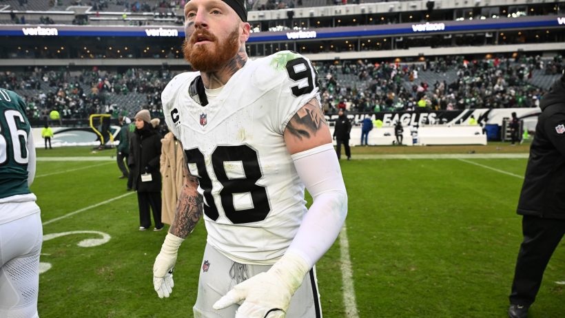 Maxx Crosby on the field in Philadelphia following a Raiders loss.