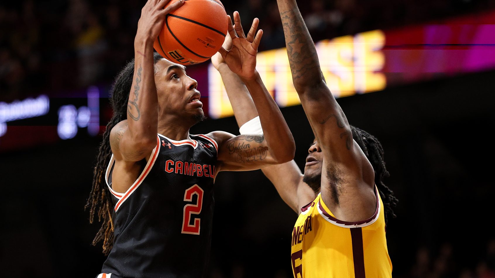 Campbell Fighting Camels guard Jeremiah Johnson rises for a layup