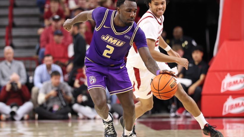 James Madison Dukes guard Bradley Douglas leads a fast break