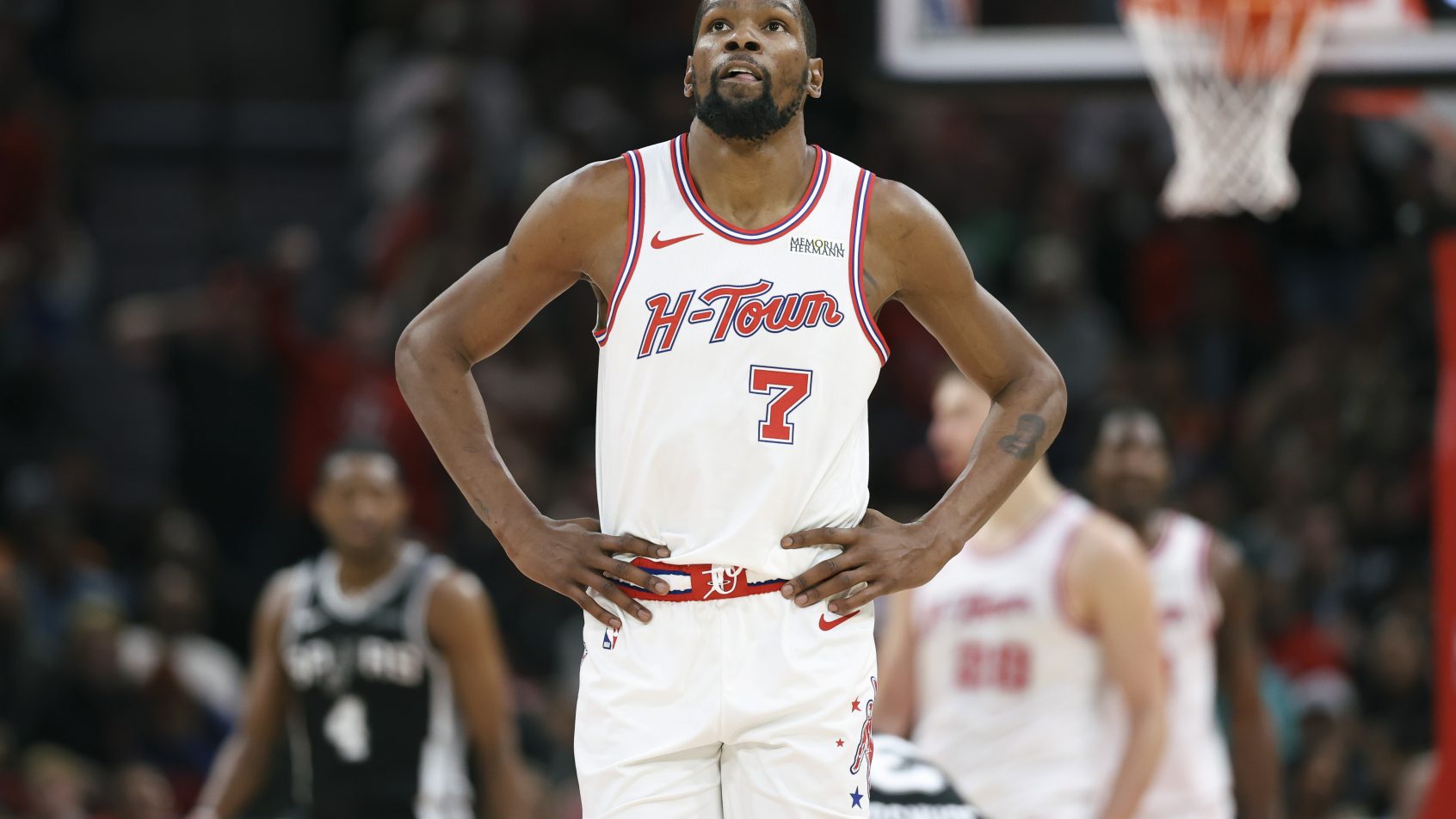 Houston Rockets forward Kevin Durant looking up at the scoreboard
