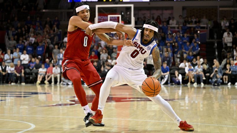 SMU Mustangs guard BJ Edwards holds off a defender