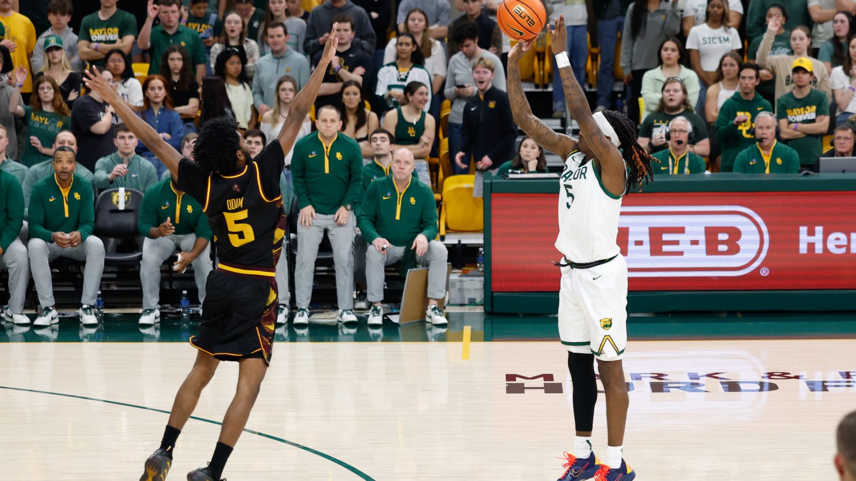 Baylor Bears guard Obi Agbim shooting a three