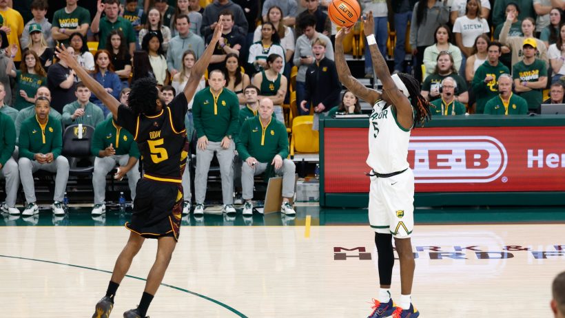 Baylor Bears guard Obi Agbim shooting a three