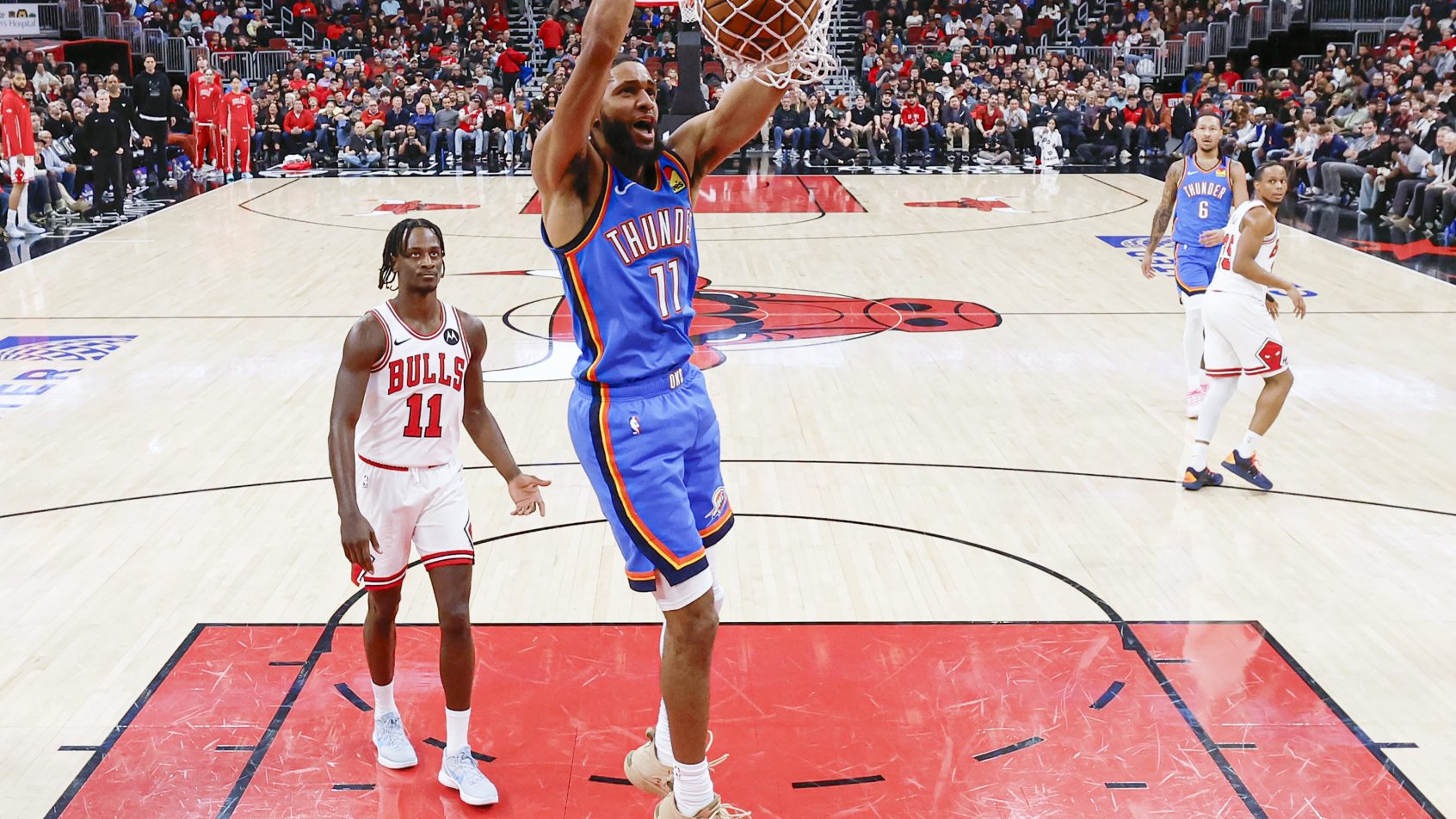 Isaiah Joe dunks the ball against the Chicago Bulls