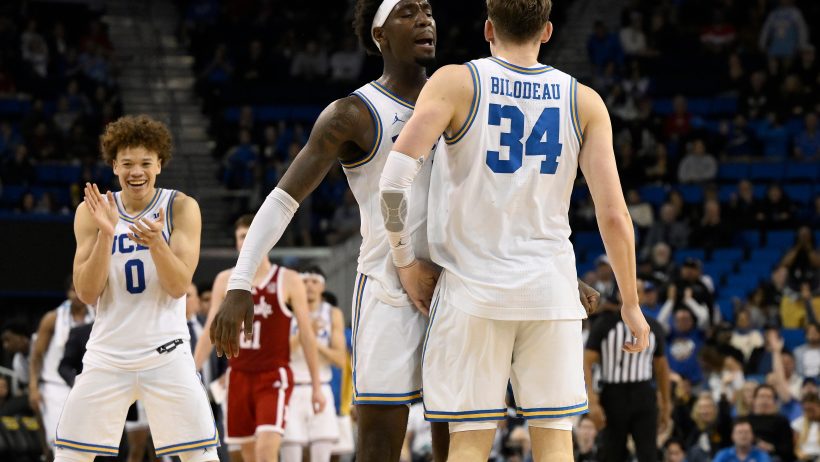 UCLA celebrates a bucket in a victory over Nebraska.