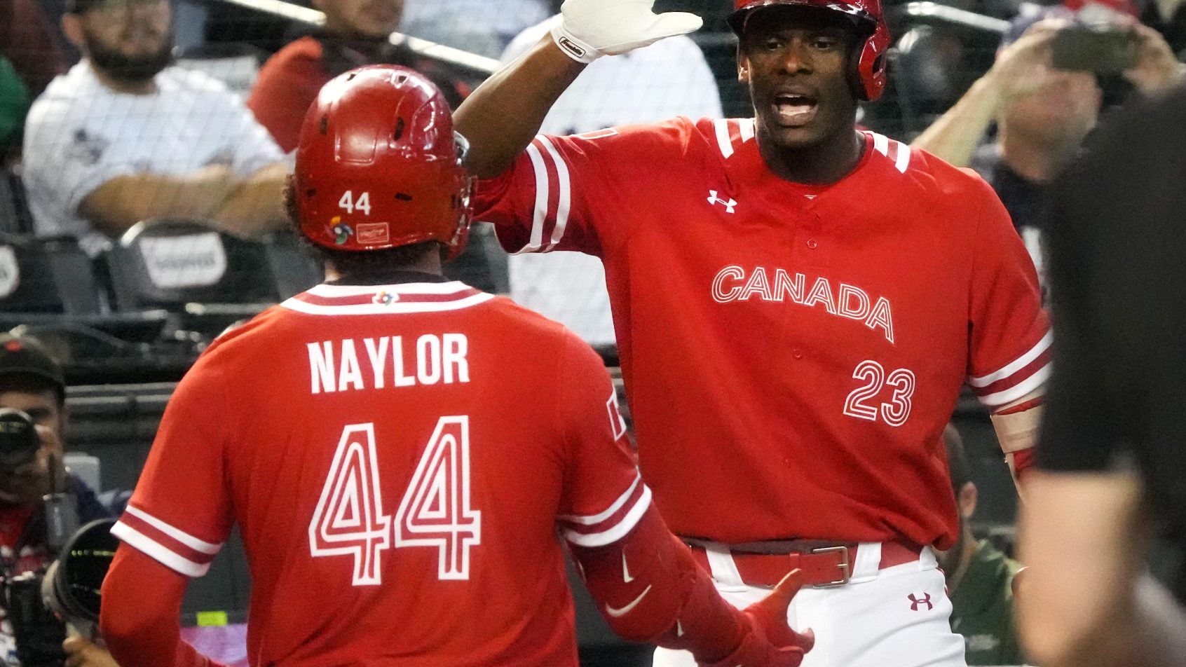 Bo Naylor celebrating with Denzel Clarke