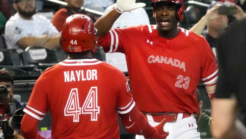 Bo Naylor celebrating with Denzel Clarke