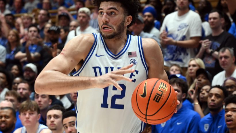 Cam Boozer drives to the hoop against UNC.