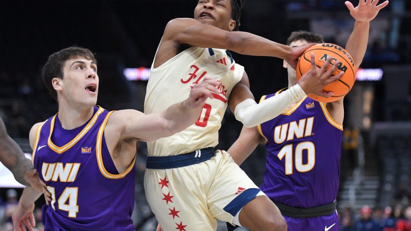 UIC Flames guard Ahmad Henderson II defended by two Northern Iowa Panthers