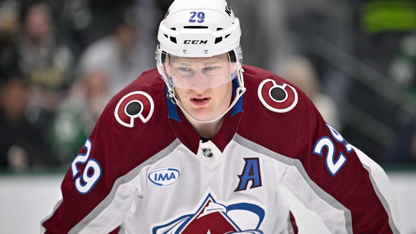 Nathan MacKinnon lines up for a face-off versus Dallas.