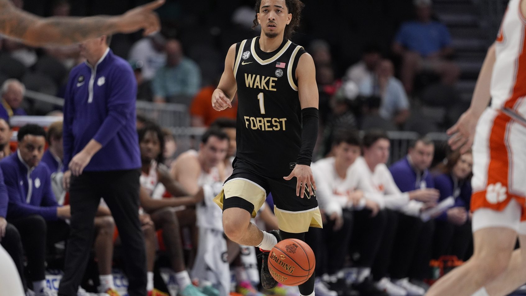 Wake Forest Demon Deacons guard Nate Calmese brings the ball up the floor