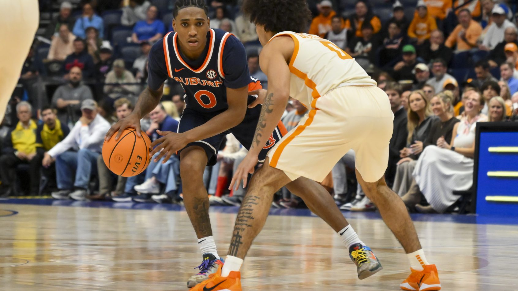 Auburn Tigers guard Tahaad Pettiford controls the ball