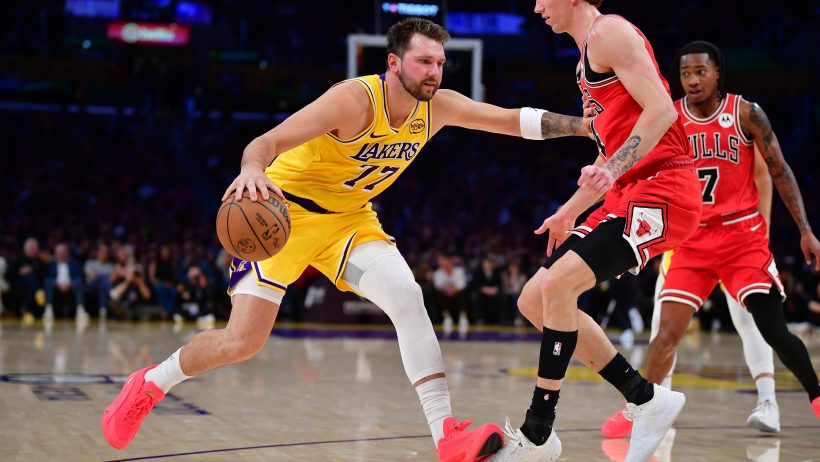 Luka Doncic moves the ball against Chicago Bulls forward Matas Buzelis