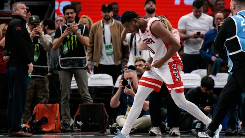 Jaden Bradley celebrates a bucket versus Iowa State in the Big 12 Tournament.